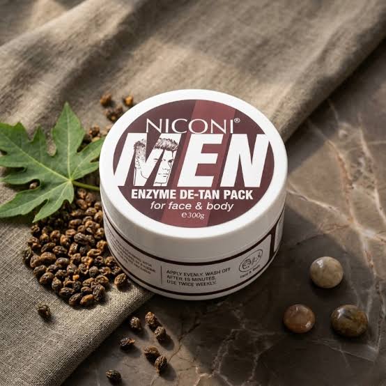NICONI Original Men Enzyme De-Tan Face & Body Pack Achieve cleaner, brighter, and healthier-looking skin with NICONI Original Men Enzyme De-Tan Face & Body Pack. Specially formulated for men, this advanced enzyme-based de-tan mask helps remove stubborn sun tan, dirt, excess oil, and impurities from the skin. The powerful de-tan formula deeply cleanses pores while improving skin texture, leaving your face and body feeling refreshed, smooth, and revitalized. This face and body de-tan pack works effectively to reduce the appearance of tanning caused by sun exposure, pollution, and environmental stress. Its skin-brightening properties help restore your natural complexion while promoting a healthy, even-toned look. Suitable for regular use, the formula is gentle on the skin and helps maintain a fresh, energized appearance. Key Benefits: ✔ Helps remove sun tan and dullness ✔ Deeply cleanses dirt, oil, and impurities ✔ Brightens and refreshes tired-looking skin ✔ Improves skin texture and smoothness ✔ Suitable for face and body application ✔ Helps restore natural skin radiance ✔ Dermatologically tested formula ✔ Designed specifically for men's skincare needs How to Use: 1. Apply an even layer on clean face and body skin. 2. Gently massage for 10 minutes. 3. Rinse thoroughly with water. 4. Use regularly for best results. Keywords: Men's De-Tan Pack, Enzyme De-Tan Mask, Tan Removal Face Pack, Face & Body Pack for Men, Skin Brightening Mask, Deep Cleansing Face Mask, Anti-Tan Skincare, Men's Grooming Products, Sun Tan Removal Pack, Men's Face Care, Skin Revitalizing Pack, De-Tan Treatment for Men. NICONI Original Men Enzyme De-Tan Face & Body Pack Achieve cleaner, brighter, and healthier-looking skin with NICONI Original Men Enzyme De-Tan Face & Body Pack. Specially formulated for men, this advanced enzyme-based de-tan mask helps remove stubborn sun tan, dirt, excess oil, and impurities from the skin. The powerful de-tan formula deeply cleanses pores while improving skin texture, leaving your face and body feeling refreshed, smooth, and revitalized. This face and body de-tan pack works effectively to reduce the appearance of tanning caused by sun exposure, pollution, and environmental stress. Its skin-brightening properties help restore your natural complexion while promoting a healthy, even-toned look. Suitable for regular use, the formula is gentle on the skin and helps maintain a fresh, energized appearance. Key Benefits: ✔ Helps remove sun tan and dullness ✔ Deeply cleanses dirt, oil, and impurities ✔ Brightens and refreshes tired-looking skin ✔ Improves skin texture and smoothness ✔ Suitable for face and body application ✔ Helps restore natural skin radiance ✔ Dermatologically tested formula ✔ Designed specifically for men's skincare needs How to Use: 1. Apply an even layer on clean face and body skin. 2. Gently massage for 10 minutes. 3. Rinse thoroughly with water. 4. Use regularly for best results. Keywords: Men's De-Tan Pack, Enzyme De-Tan Mask, Tan Removal Face Pack, Face & Body Pack for Men, Skin Brightening Mask, Deep Cleansing Face Mask, Anti-Tan Skincare, Men's Grooming Products, Sun Tan Removal Pack, Men's Face Care, Skin Revitalizing Pack, De-Tan Treatment for Men.